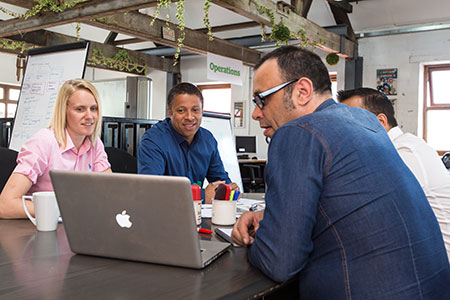 Book Clarity bookkeepers reviewing financials with a client