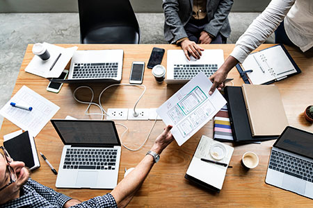 The Book Clarity team collaborating over financial reports